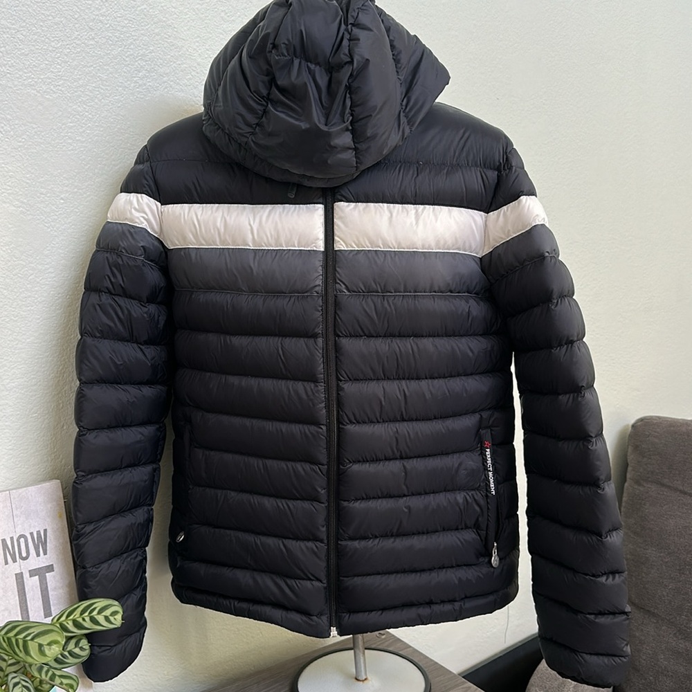Goose down and feather jacket. Size L.